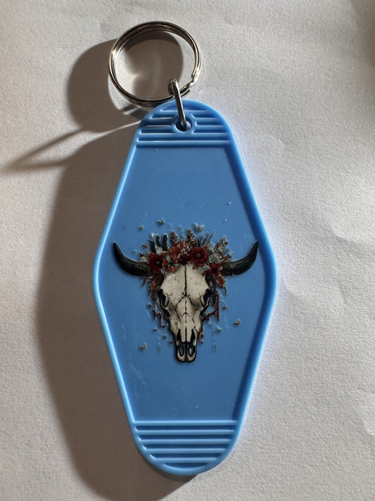 Western motel keychain with skull design