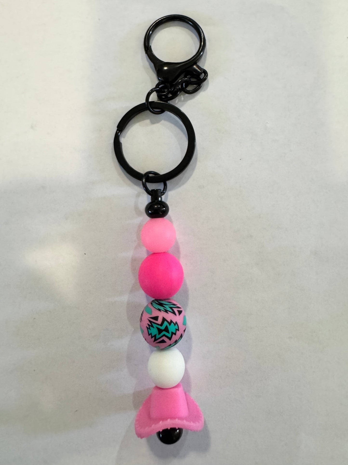 Keychain with colorful beads on a white background