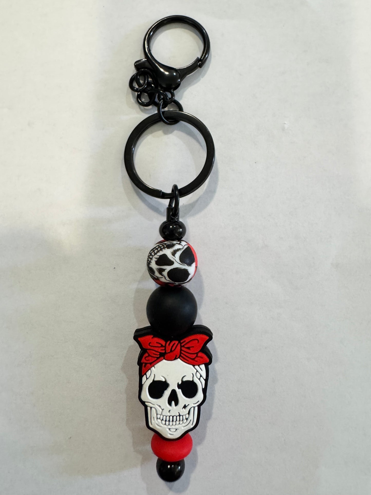 Keychain with skull design on a white background